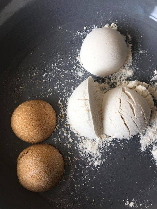 scoops of flour and brown sugar