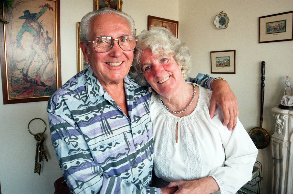 A couple hugs as they celebrate their anniversary.