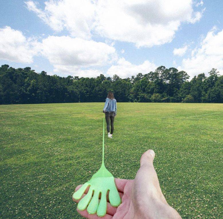 couple extending a stretchy sticky hand very far