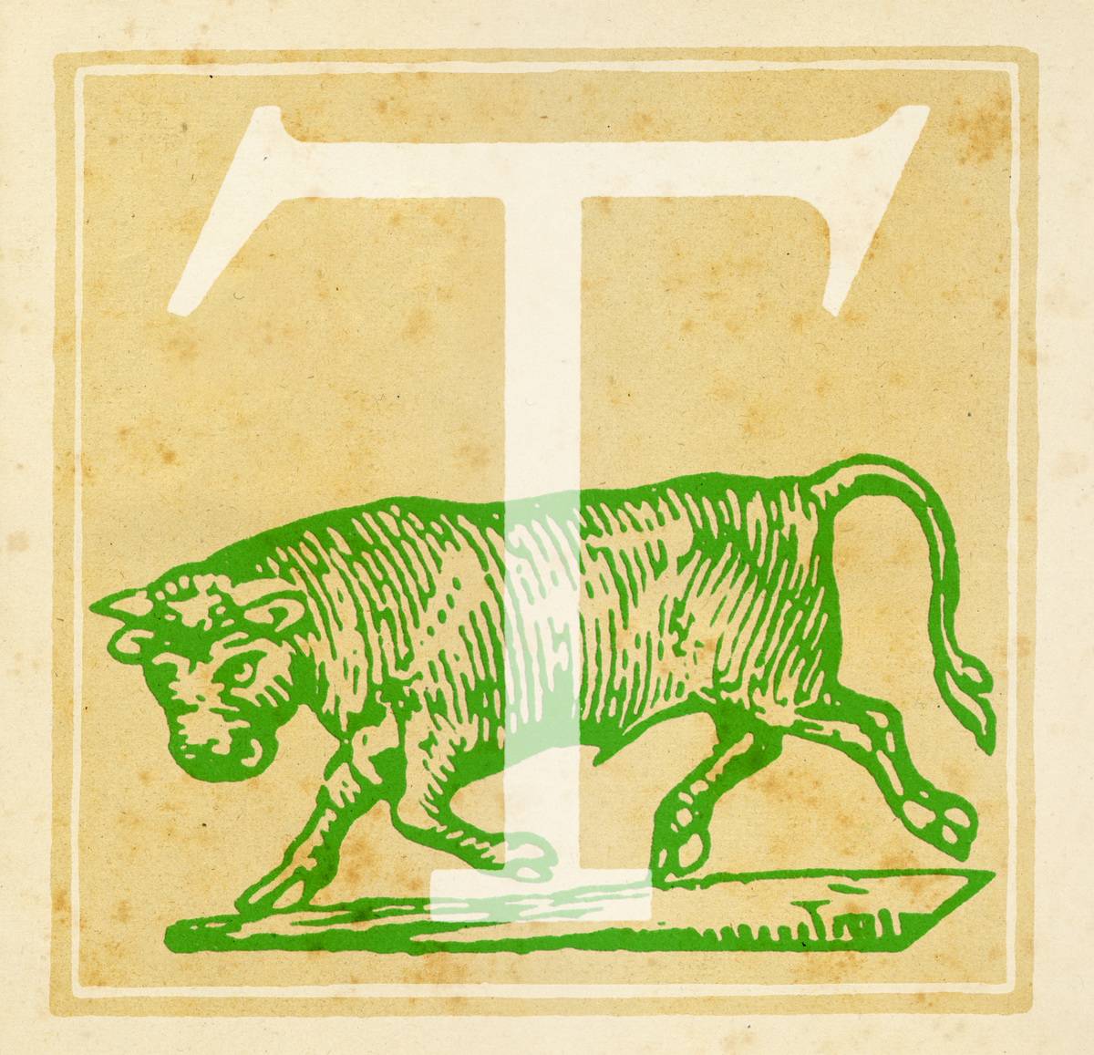 Capital letter T with a bull behind it - the zodiac sign of Taurus 