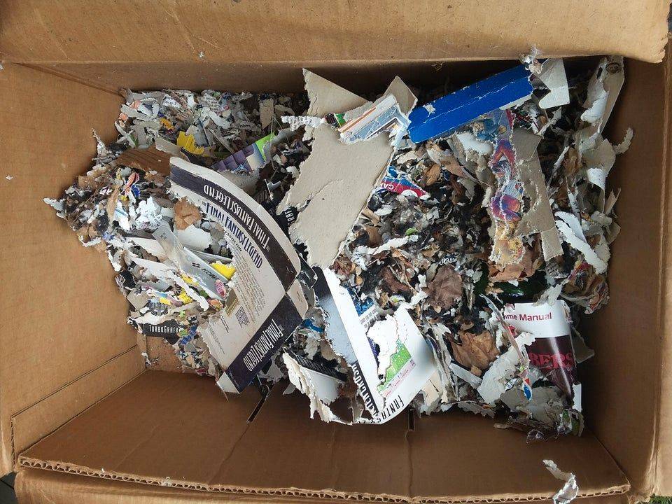 ripped cardboard in a box