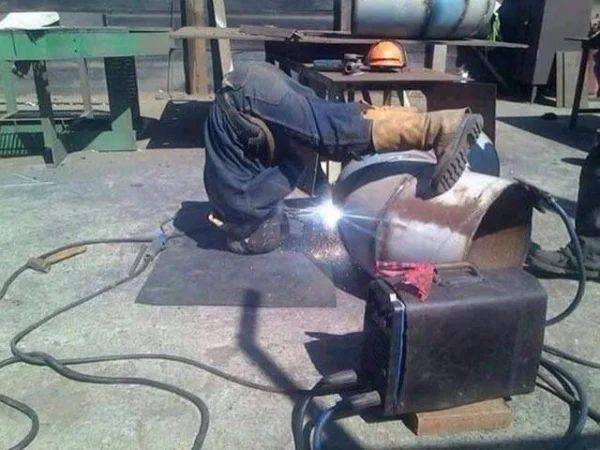 upside down man doing work