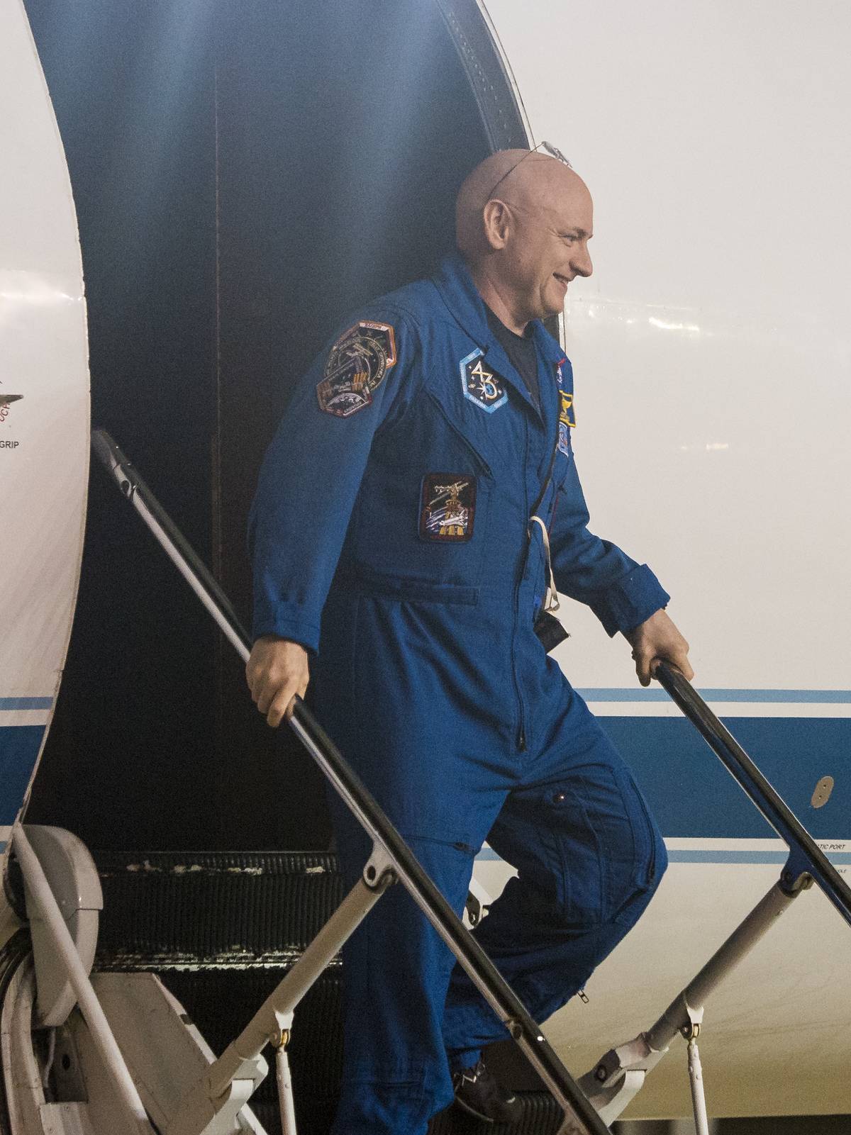 Scott Kelly exits the rocket after his space expedition.