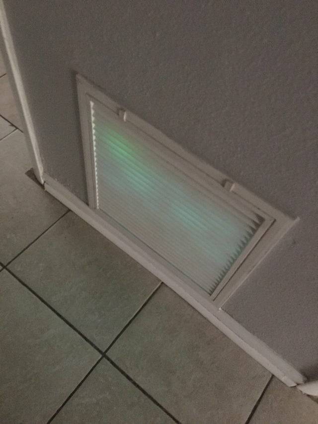 vent with green blue glowing light