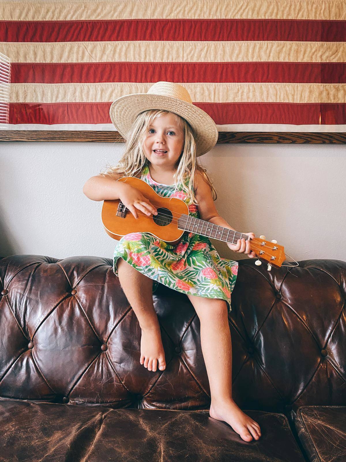 little girl with ukulele