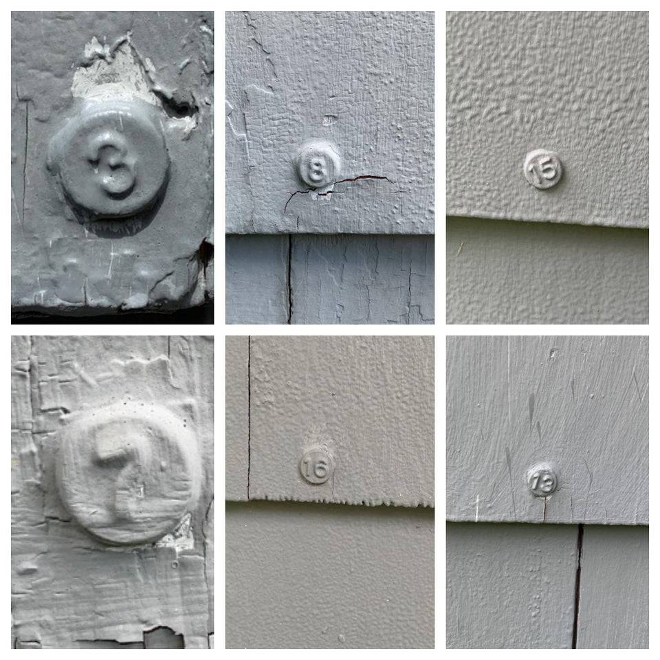 numbered nails on house 