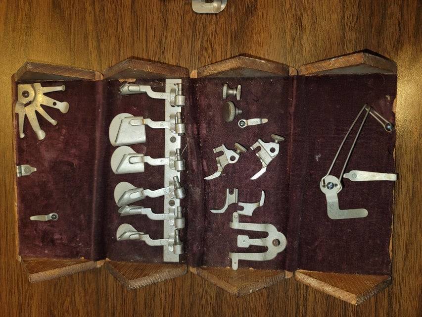 case full of metal attachments and tools