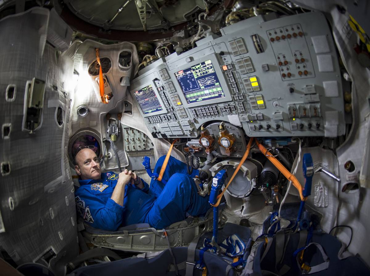 Scott Kelly sits inside of a rocket in preparation to go to space.