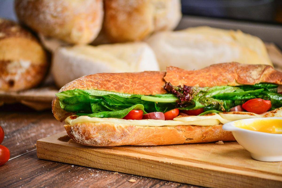 sub sandwich on cutting board