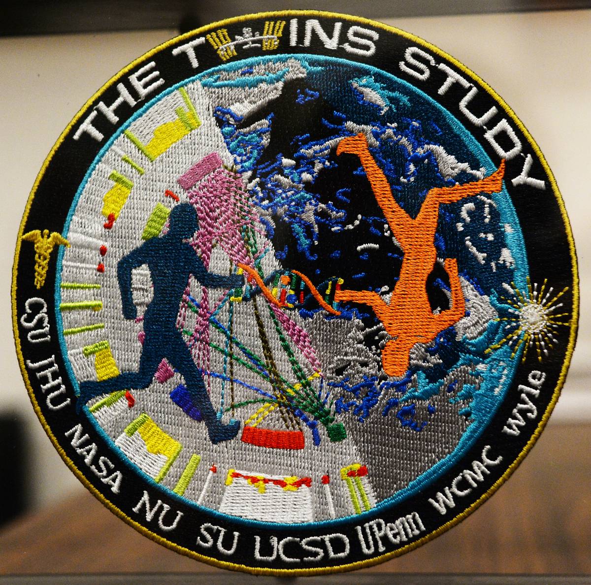 A patch portrays the logo for the NASA Twins Study.
