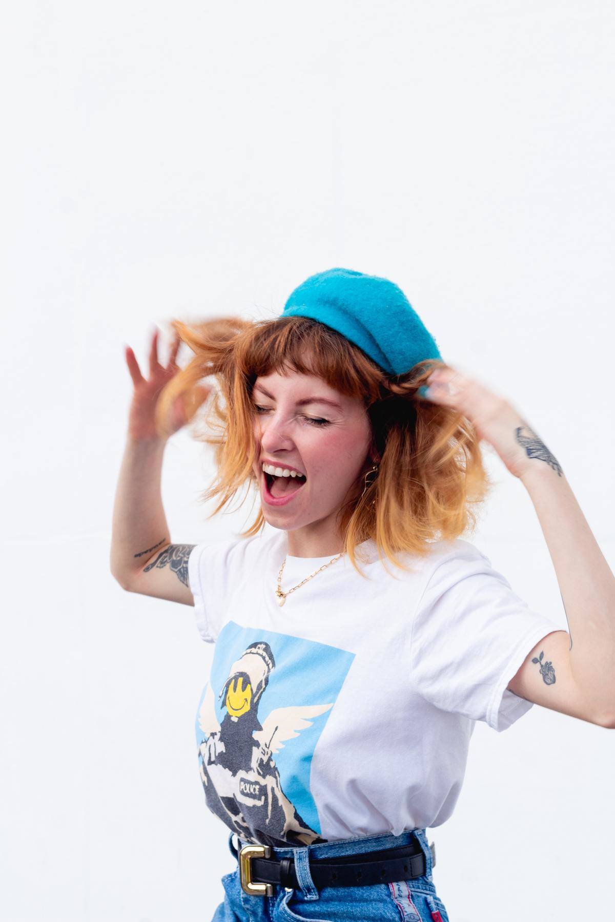 woman feeling crazy with blue berret