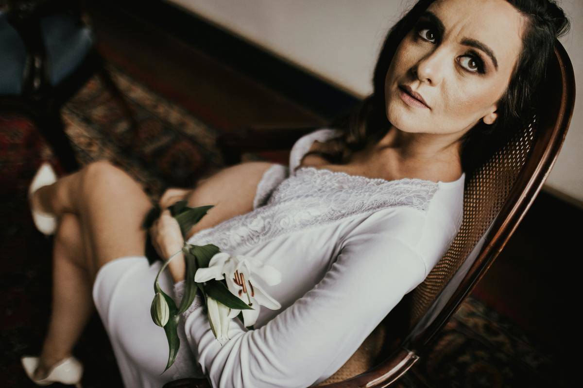 woman looks upset on chair