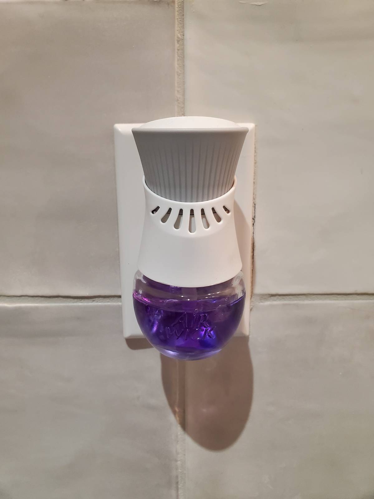 Air Wick Air Freshner plugged into wall