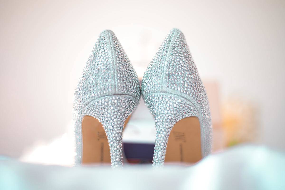 Pair of silver crystal wedding high heel shoes
