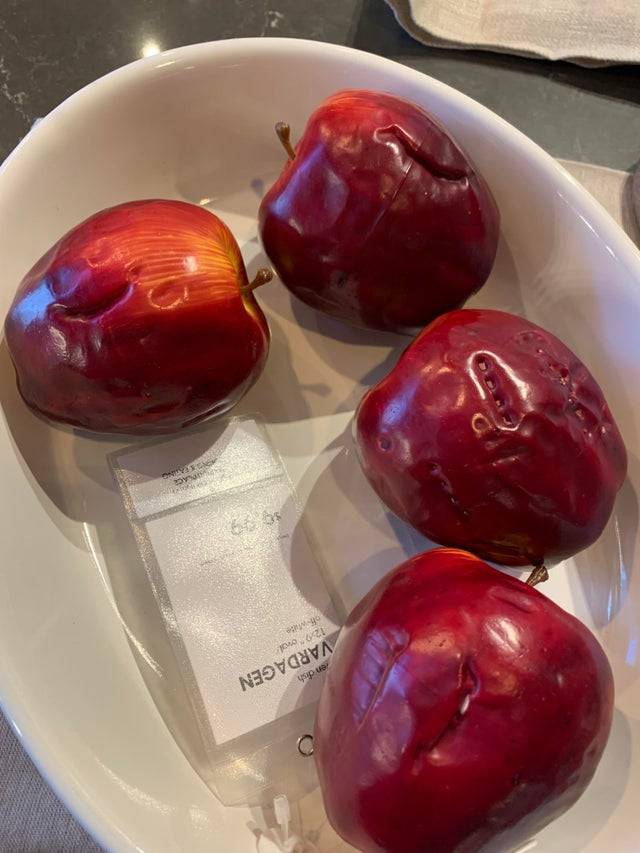 bites taken out of display apples