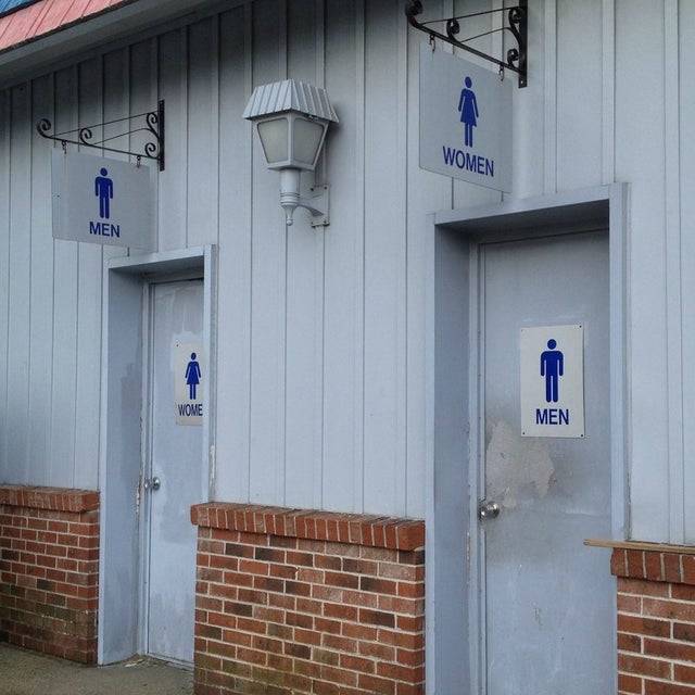 mislabeled bathroom doors