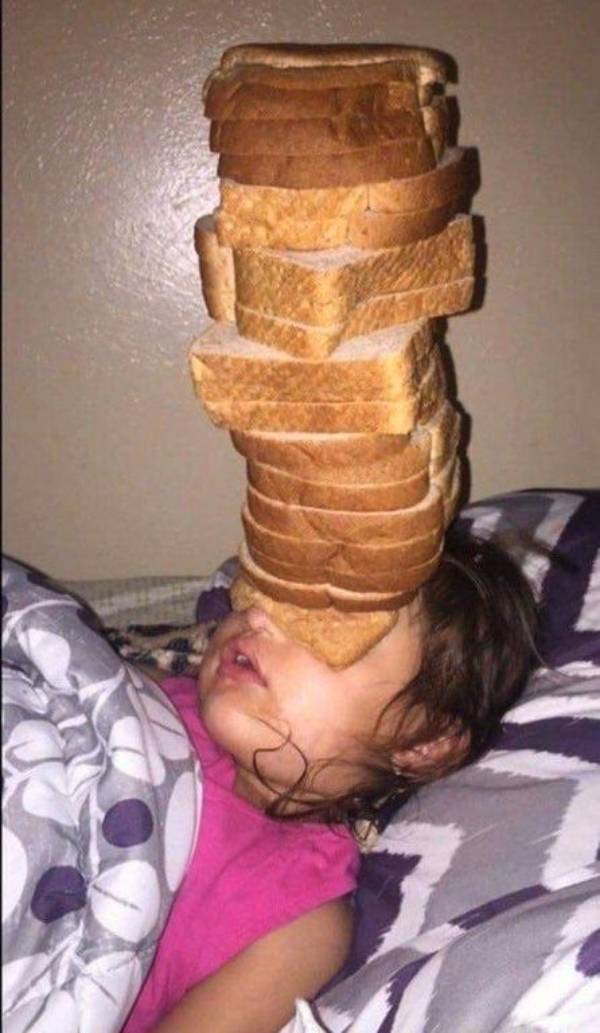 bread on her face while sleeping
