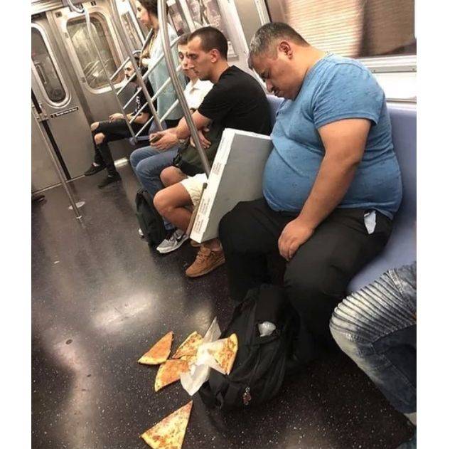 dropped pizza on the subway