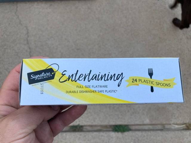 box of plastic spoons with picture of fork on it
