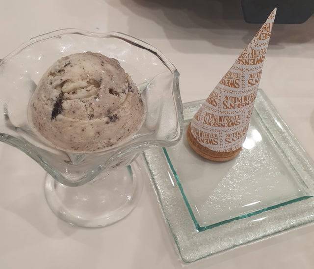 ice cream next to cone