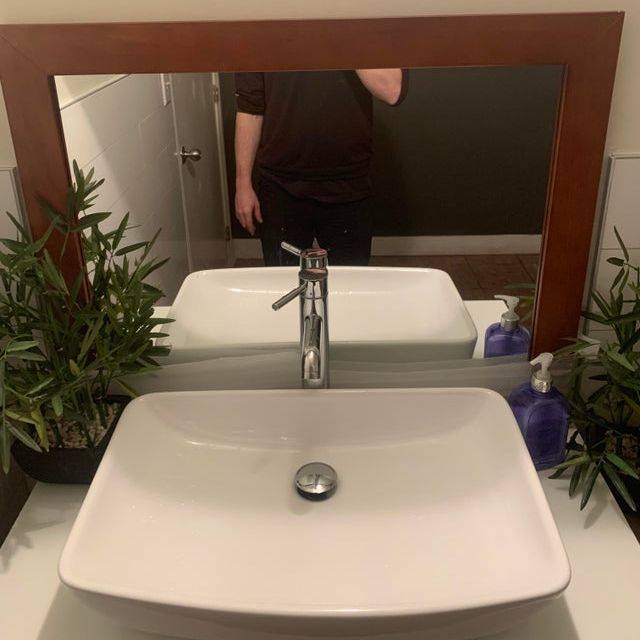 mirror too low for person standing