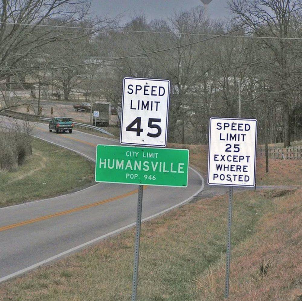 conflicting speed limit signs where one says 45 the other says 25