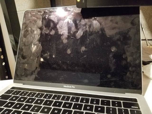 laptop with lots of fingerprints on screen