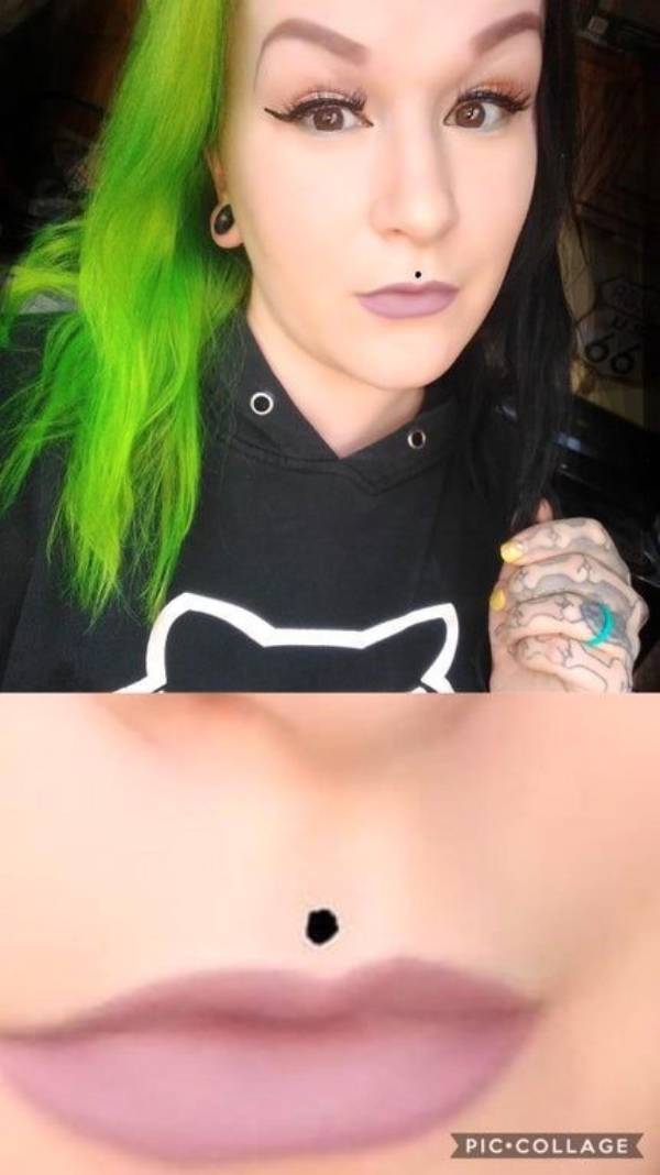 tattoo or mole on her lip?