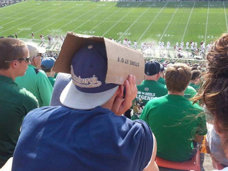 using cardboard instead of his hat
