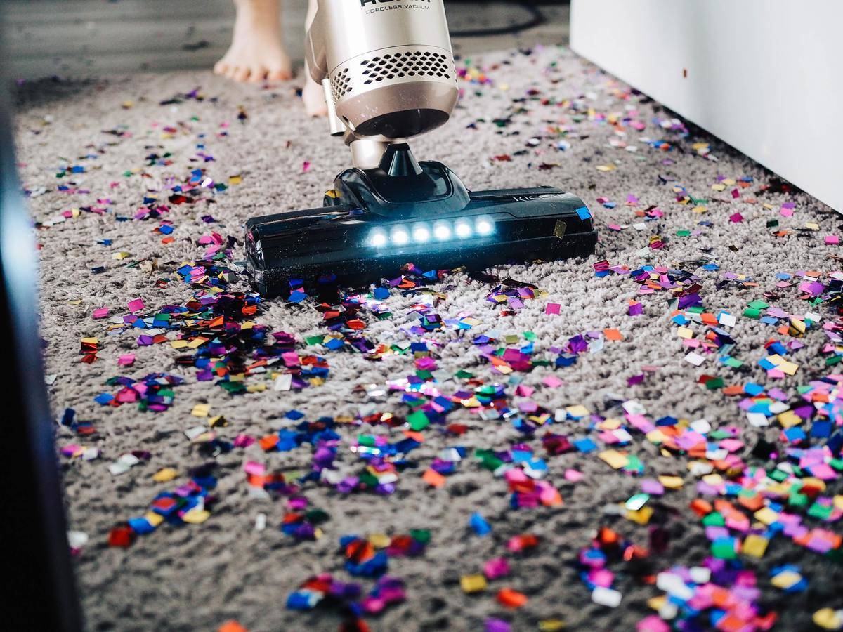 vacuuming colors on carpet with glitter