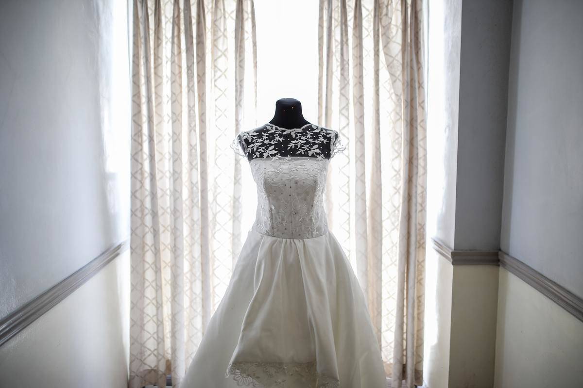wedding dress on mannequin in window