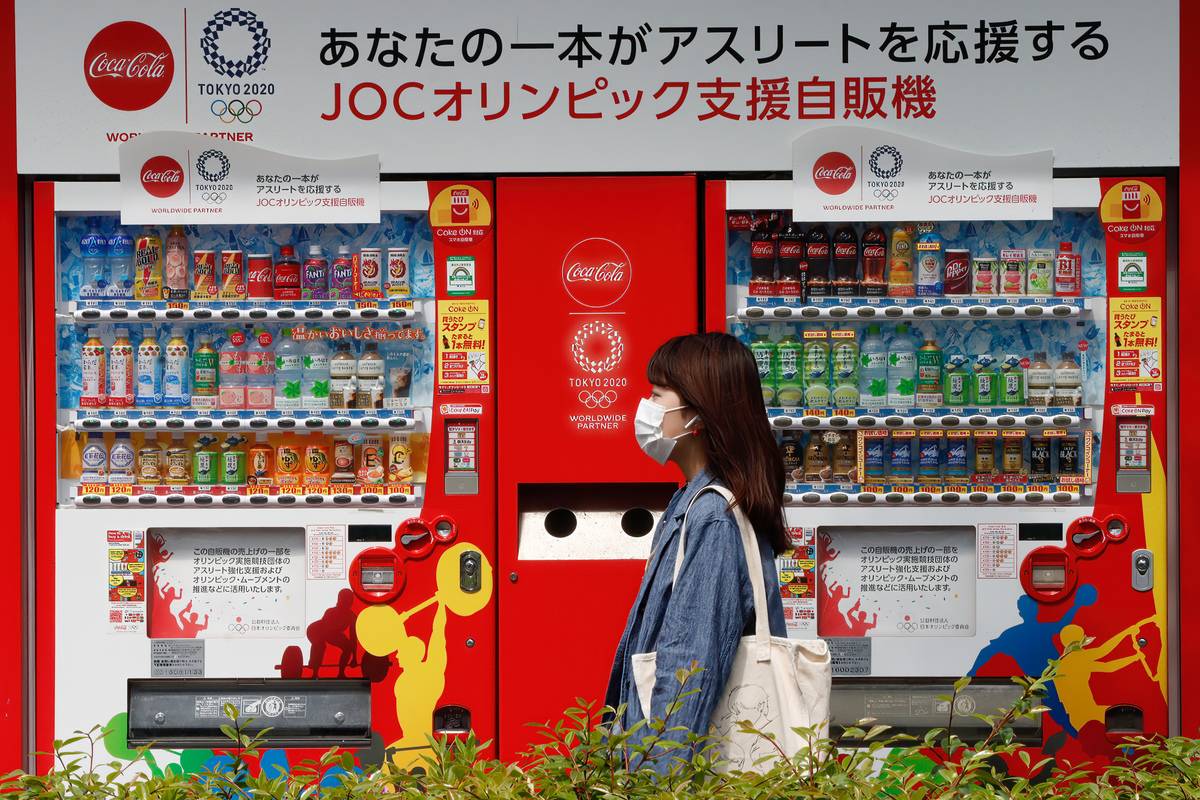 woman next to vending machines