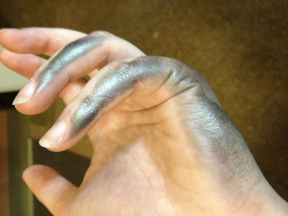 pencil marks on left hand