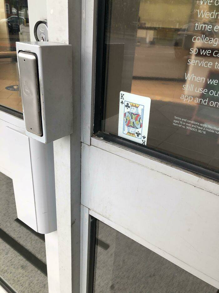 king in window at an establishment