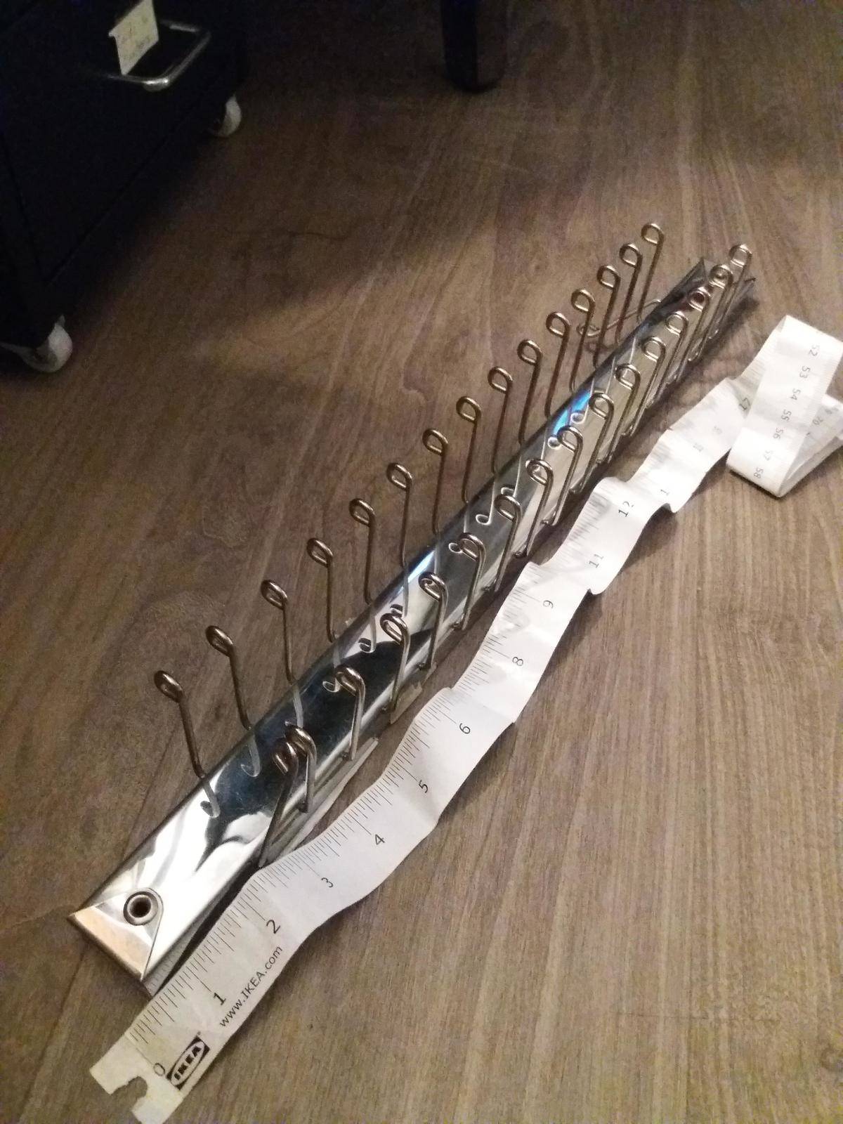 metal hooks around a foot long