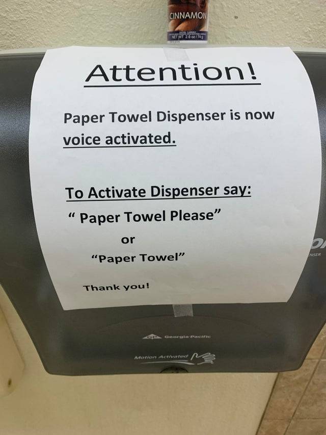 paper towel sign saying it's voice-activated