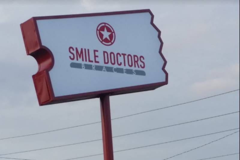 smile doctors sign on blockbuster