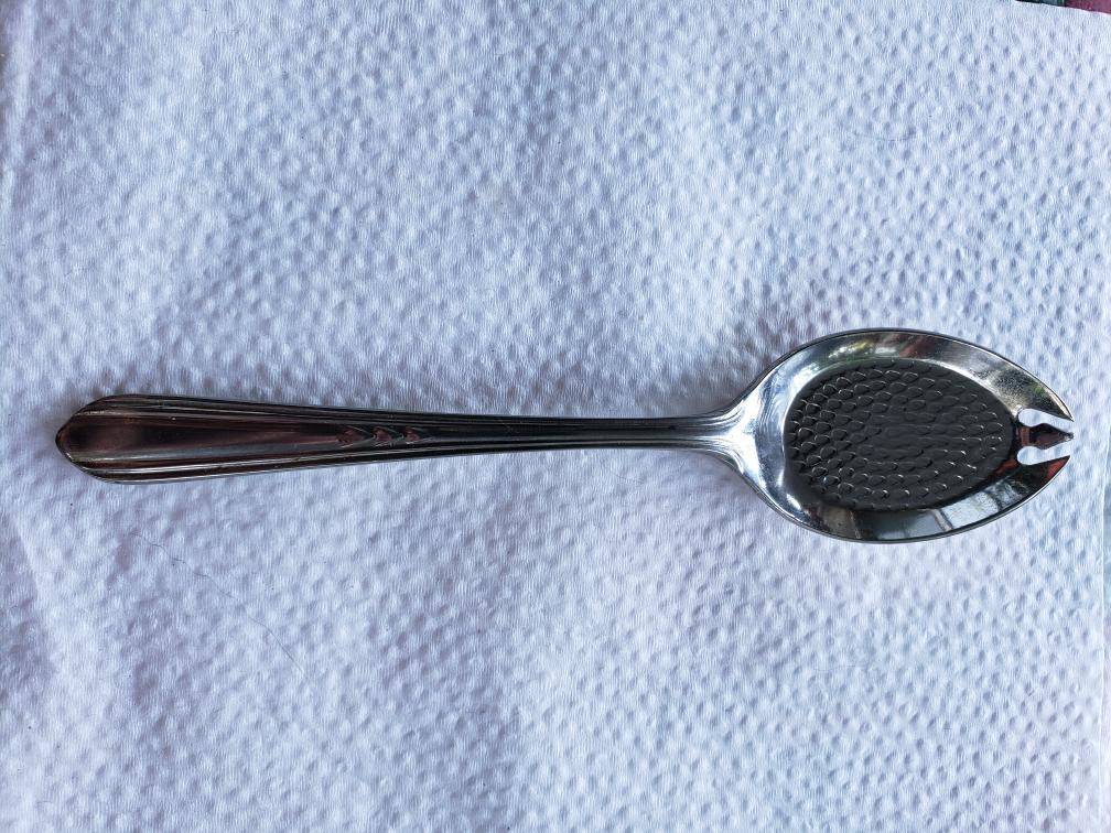 strange spoon with circles on it