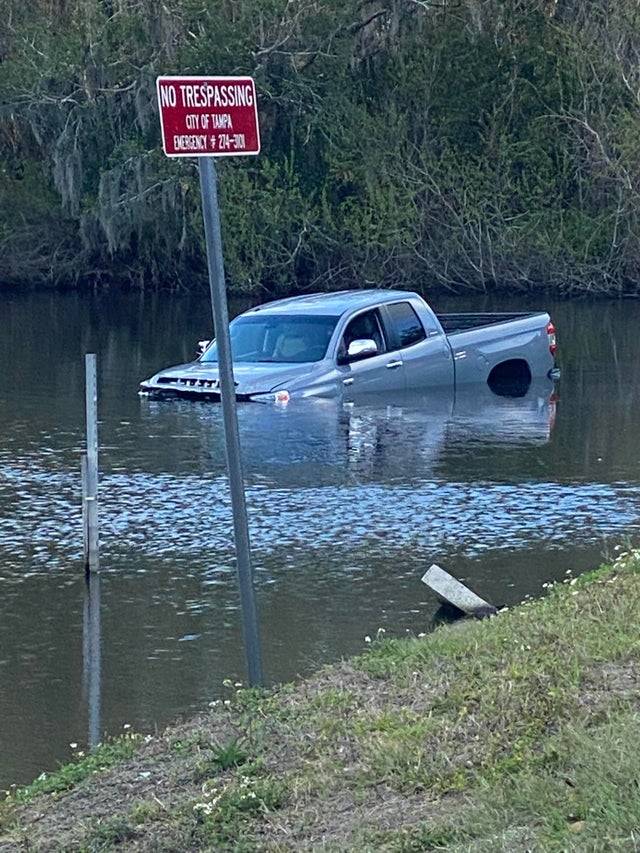 truck in the water and sinking