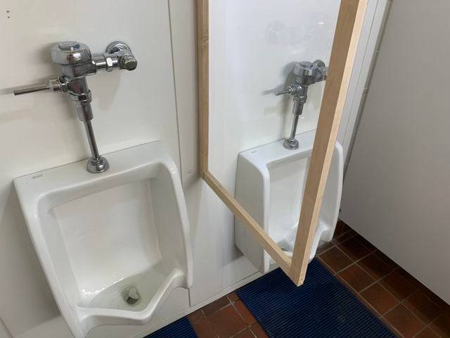 divider between urinals