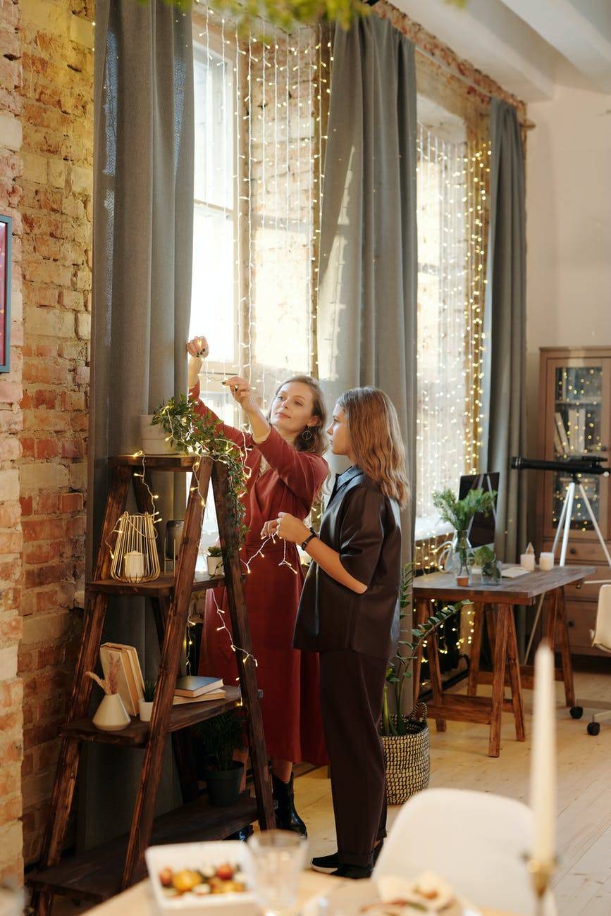 mom and daughter decorating together