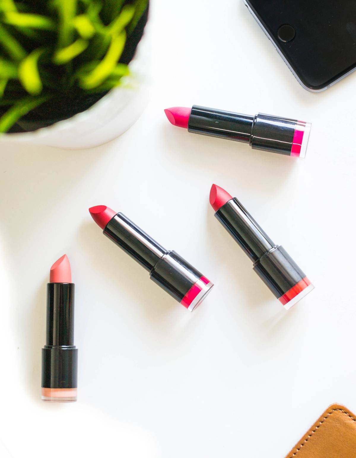Multicolored lipsticks on table