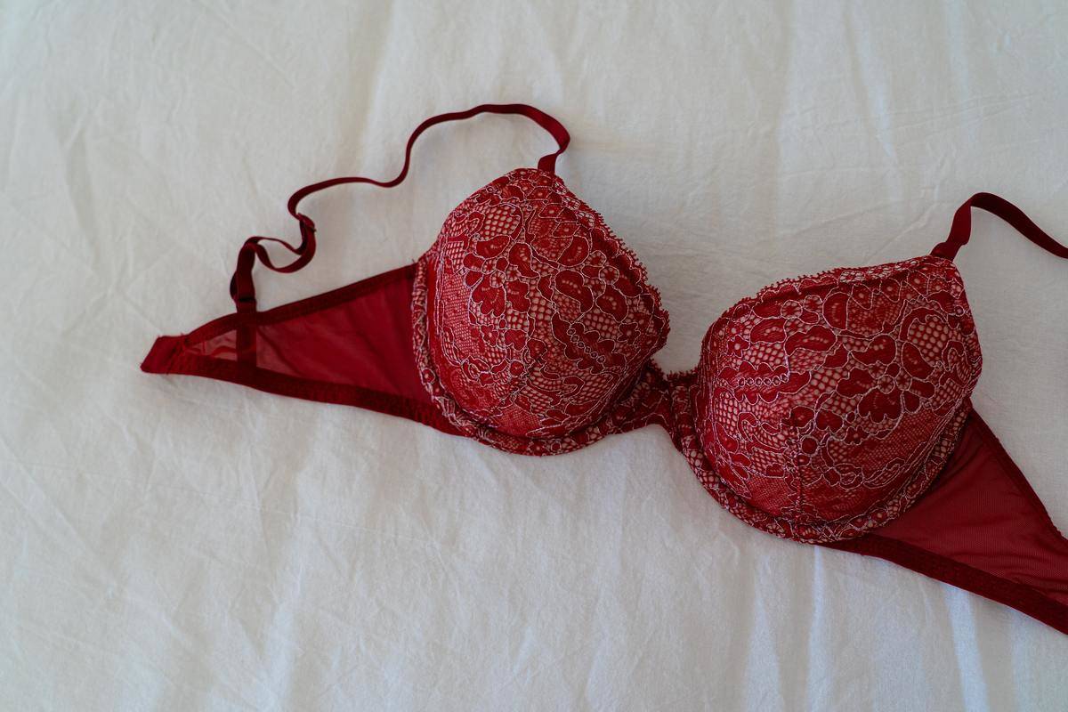 Red bra on bed