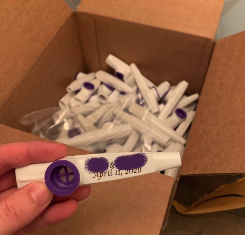 kazoos with printed wedding date, but hardware on instrument blocks the date