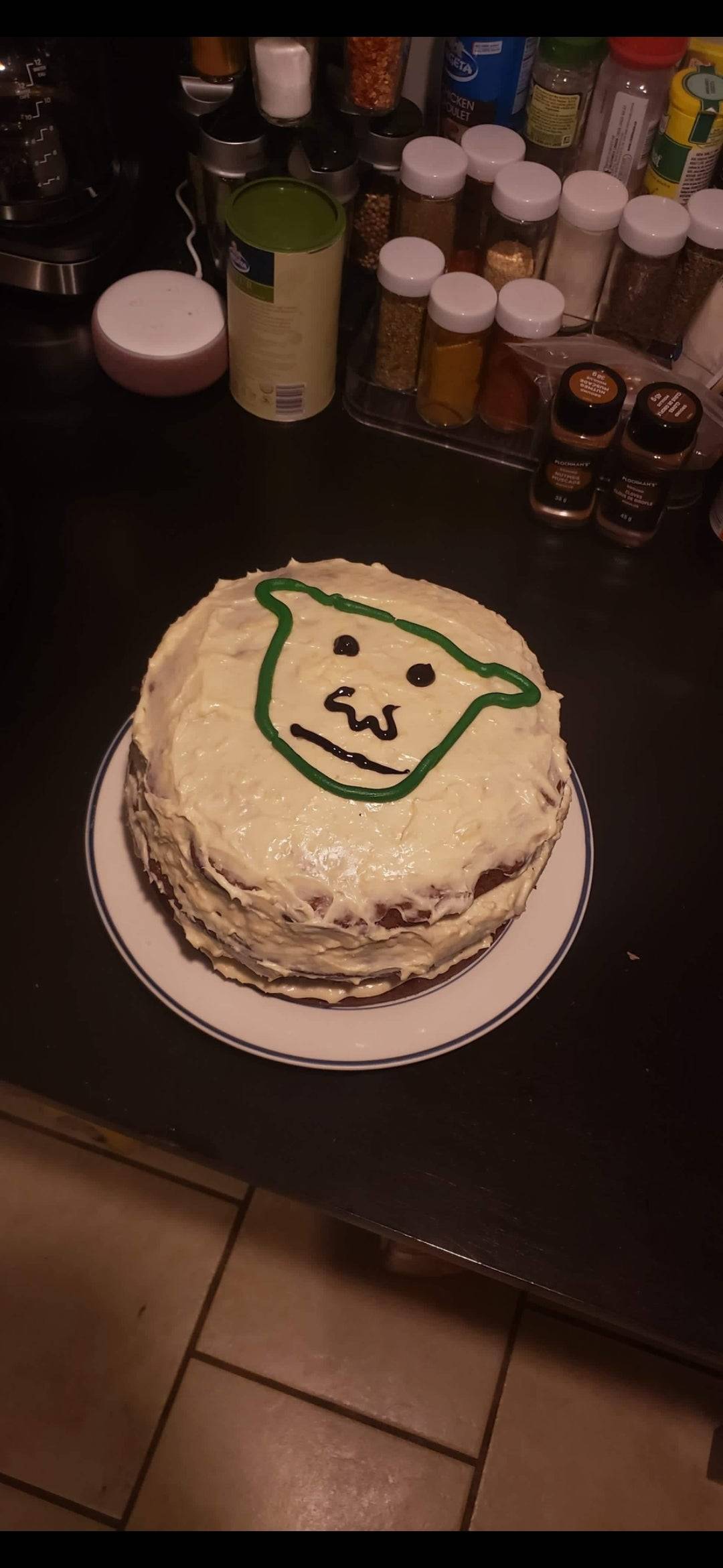 Cake decorated to look like Shrek (but it does not look like Shrek)