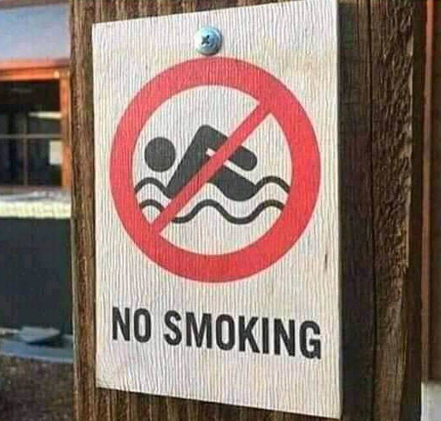 swimming graphic on no smoking sign
