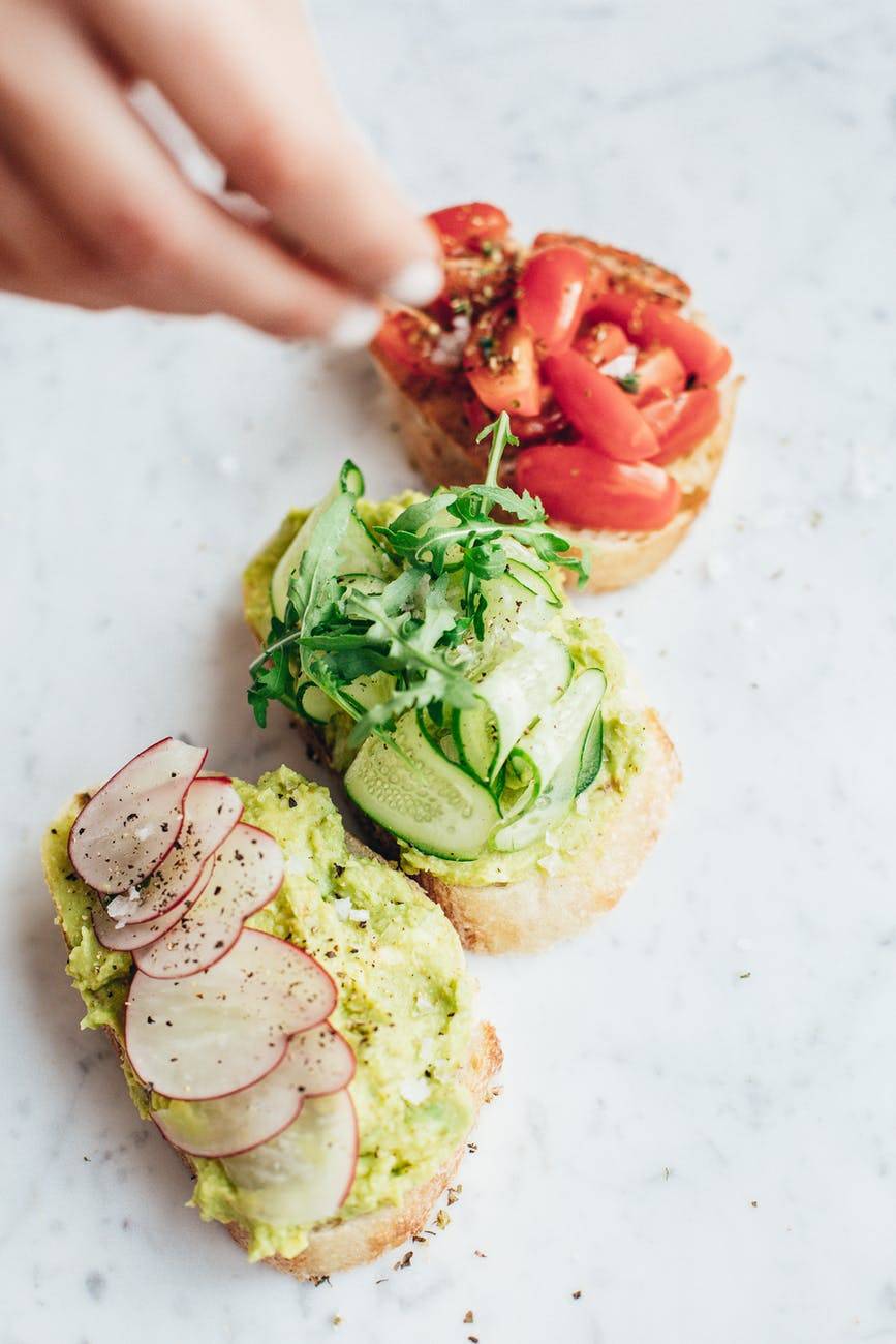 three slices of avocado toast 