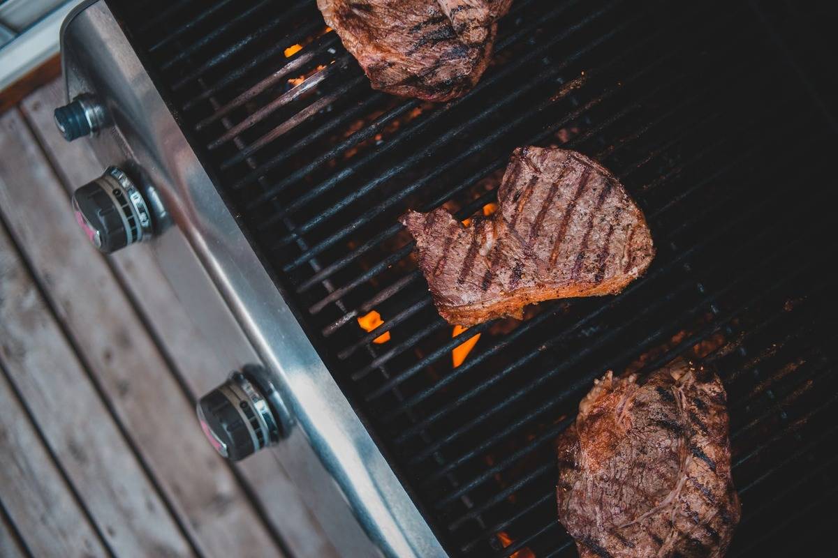steaks on barbeque