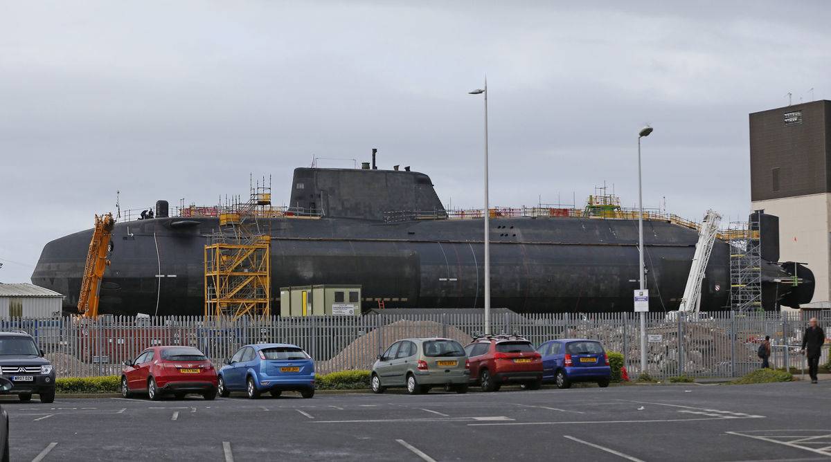 A submarine is docked for repairs.