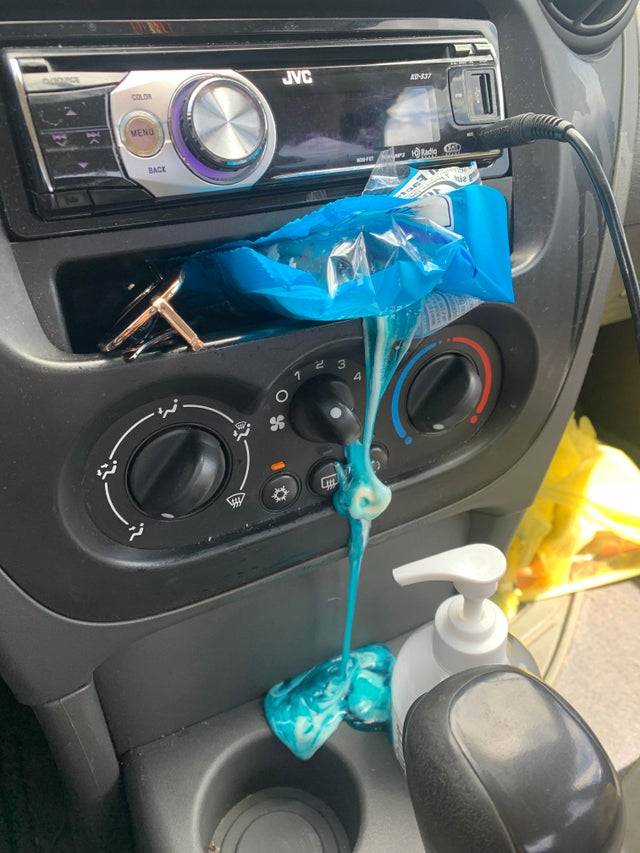 candy bag left open in car in Arizona which has melted onto the console
